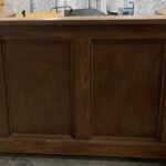 A Long Dark Wood Portable Bar with accommodate bartenders<br class=